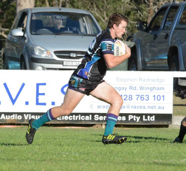Consistent Taree City forward Will Clarke charges forward during a clash at Wingham this year.