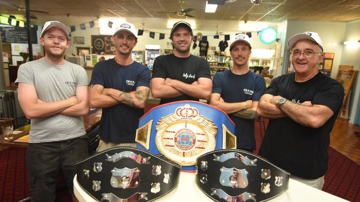 Ready to rumble: Robert Heath, promoter Beau Callaghan, Adam Fitzsimmons, Brendan Nash and Mark O'Neill from the Old Bar Tavern with the belts that will be on the line in the Battle of Old Bar at the tavern on Saturday.
