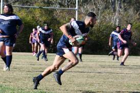 Josh Wood races into open spaces for the Ratz during last season's grand final against Wauchope. The Ratz and Old Bar Clams meet at Taree Rugby Park tomorrow.