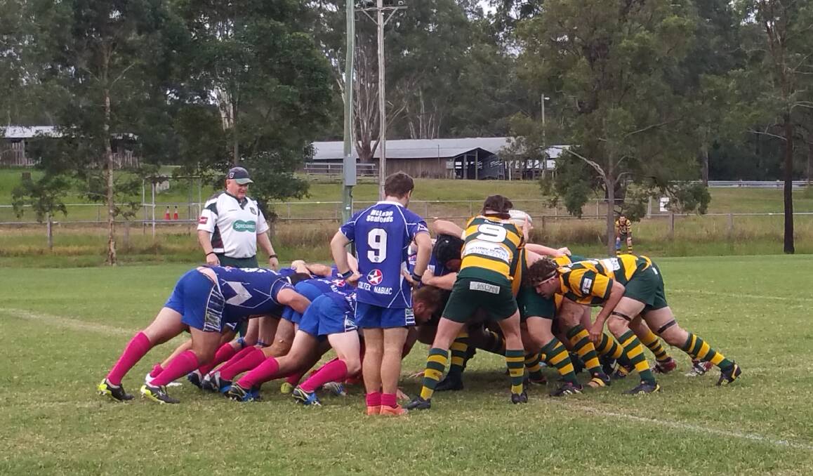 Forster-Tuncurry and Wallamba forwards pack down for a scrum in the clash at Nabiac.