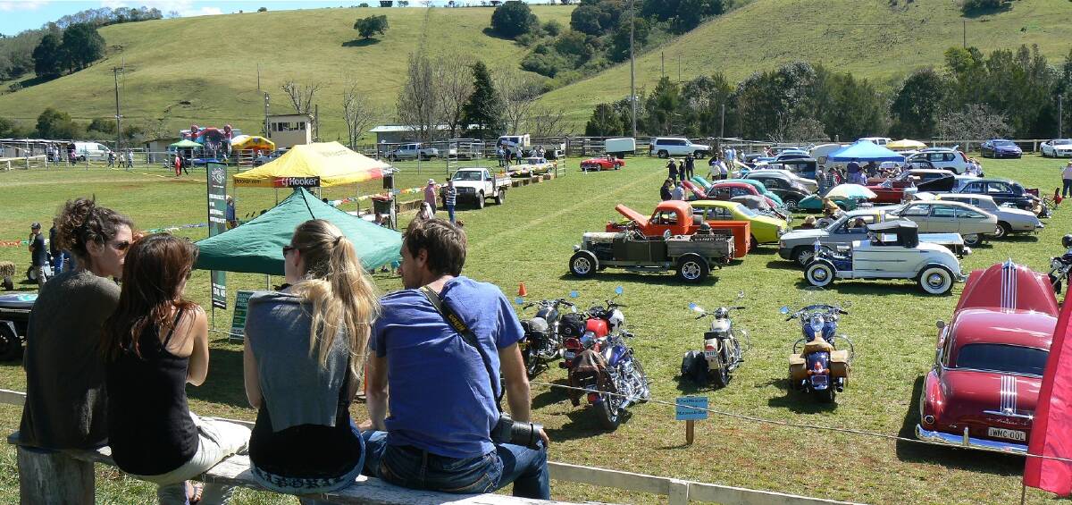 Big program: A previous year at the Comboyne Showground with the mower racers and a big lineup of car club and classic motorcycles on display. 