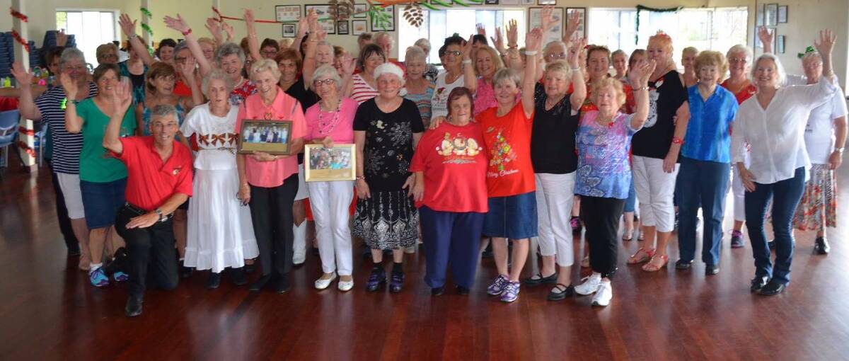 Life members June McLean and Heather McGregor and the Mid North Coast Bootscooters at their Christmas social.