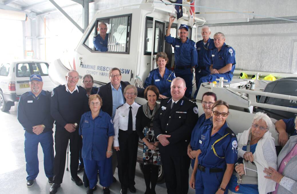 Minister for Emergency Services Troy Grant and member for Port Macquarie Leslie Williams with members of the Crowdy Harrington Marine Rescue unit.