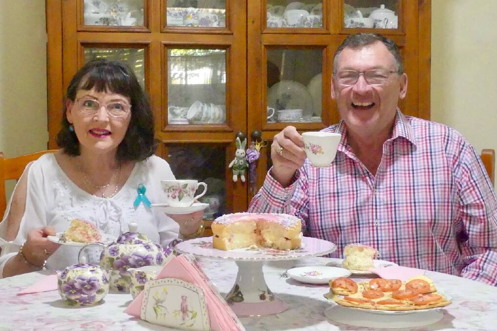 George Hoad with sister Mary Sutherland enjoying a cuppa and discussing plans for the fundraising high tea. Picture supplied
