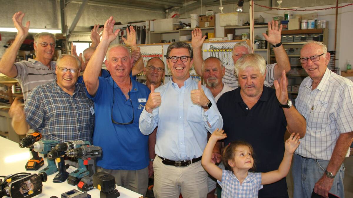 Thumbs up: Federal member David Gillespie (centre) with Harrington Men's Shed members John Eldridge, Neville Woods, Bill Burges, Mile Kelly, Billy Roberts, Paul Flanagan, Ron Cunningham, Dave Johnson and Dave Pollard, and Makayla.