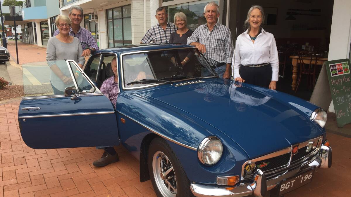 May 2017: The coffers of Manning Valley Push for Palliative were boosted by the Taree Historic Motor Club's Neville Gregory Memorial Long Run. Pictured are Taree Historic Car Club members (from left) 1972 MGB GT owner Peter Eaton, Jan and Mal Shultz and Garry and Alison Fowler presenting cheques to Manning-Great Lakes Riding for the Disabled Association president Keith Timperley and Manning Valley Push for Palliative Care chairperson Judy Hollingworth