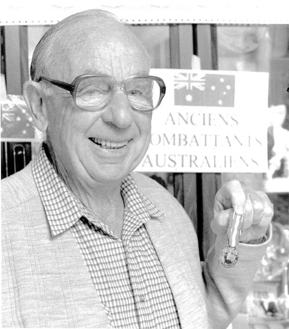 Representing Australia: Vic Carle with his D Day commemorative medal. D Day is the military term for a secret date on which a major action is to begin.