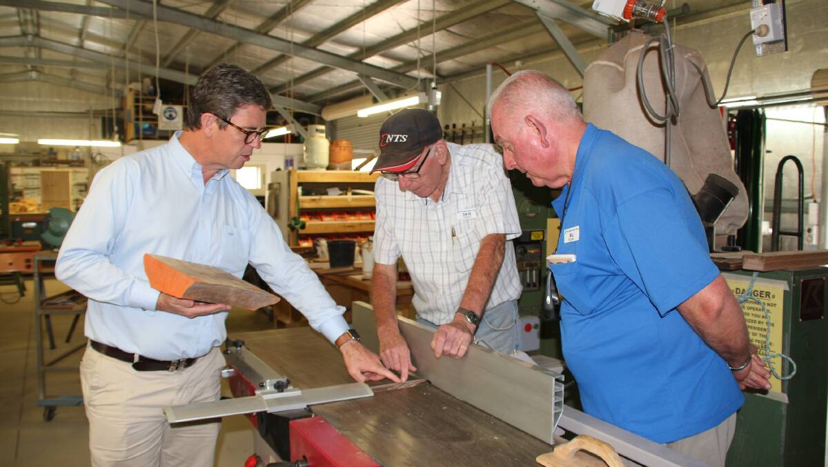 Community projects: Federal member for Lyne, David Gillespie with Harrington Men's Shed members David Pollard and Bill Burges.