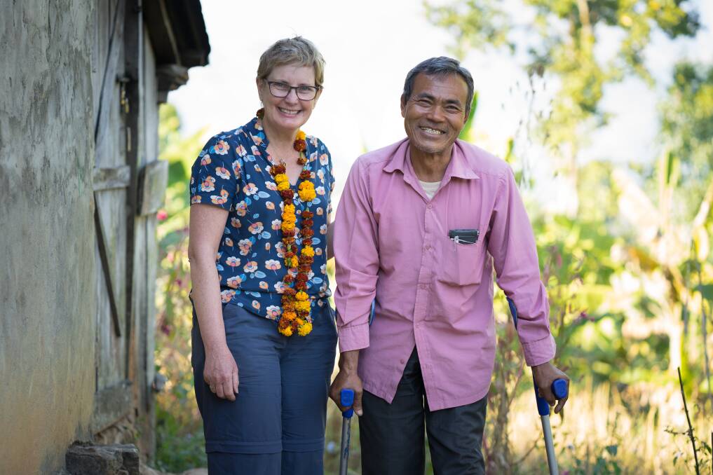 Pam Lake in Nepal with one of the Leprosy Mission's beneficiaries.