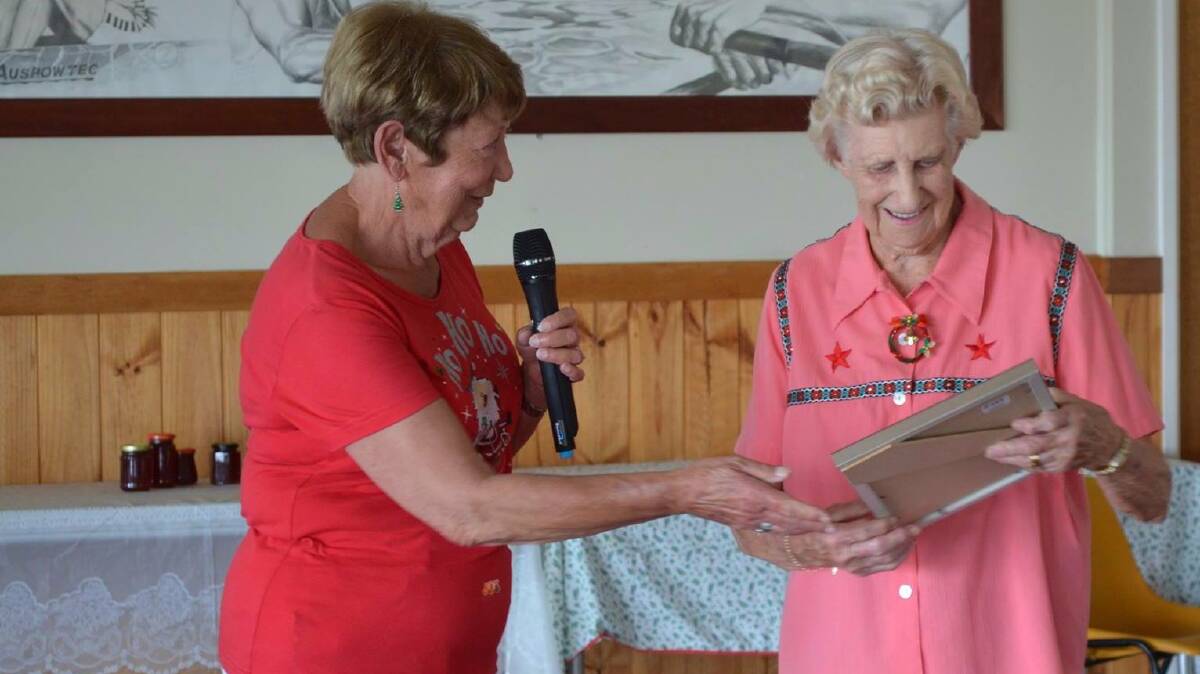 Mid North Coast Bootscooters bestow life membership to 86-year-old June McLean.