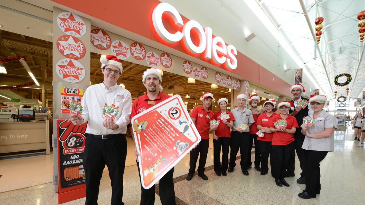 Redkite support: David Judd, Nic Cameron, Graham Swan, Kayla Orphin, Brad Bennett, Brett Daniels, Lynne Dean, Ross Birrell, Michelle Smith and Biancah Hardes from Taree's Coles supermarket rally for the cancer charity..