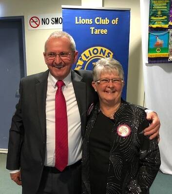 Taree Lions Club's outgoing president Allen Lenton with incoming president Di Brooker.