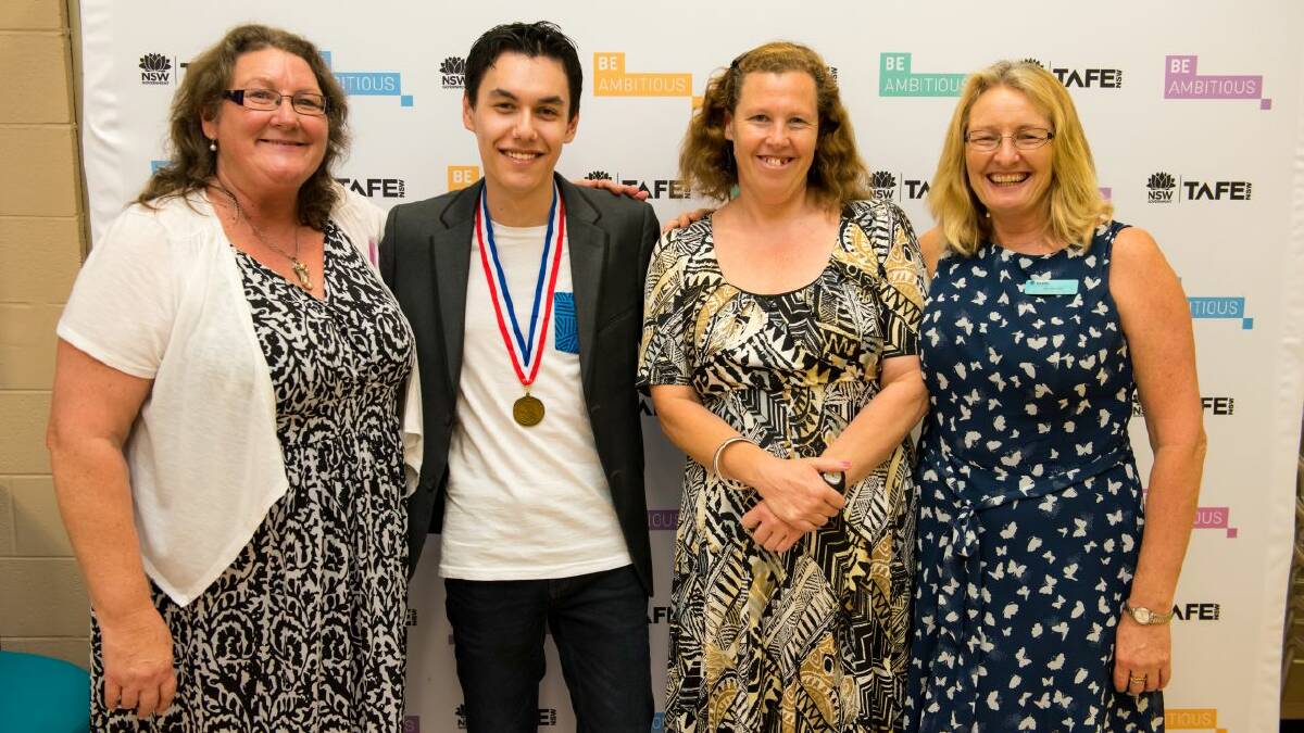 Award winner Jimmy Linke at TAFE NSW Taree Awards with (from left) Ms Linke, head teacher Belinda May and teacher Deb Kelly.