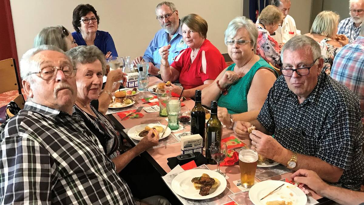 Some of the members and guests enjoying themselves at the RSL Christmas dinner.
