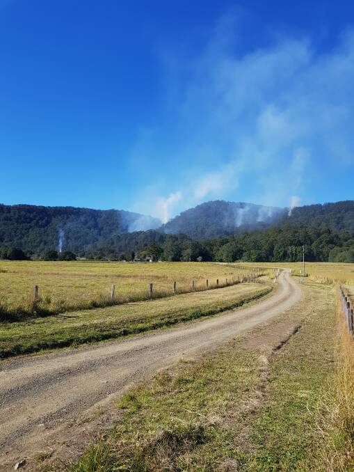 On the scene: The view of the fire from Koolah Creek Road. The Lansdowne Rural Fire Service were joined by other crews to control the blaze. Photo: Lansdowne Rural Fire Service.