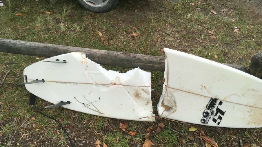 Colin Rowland's surfboard snapped into five pieces.