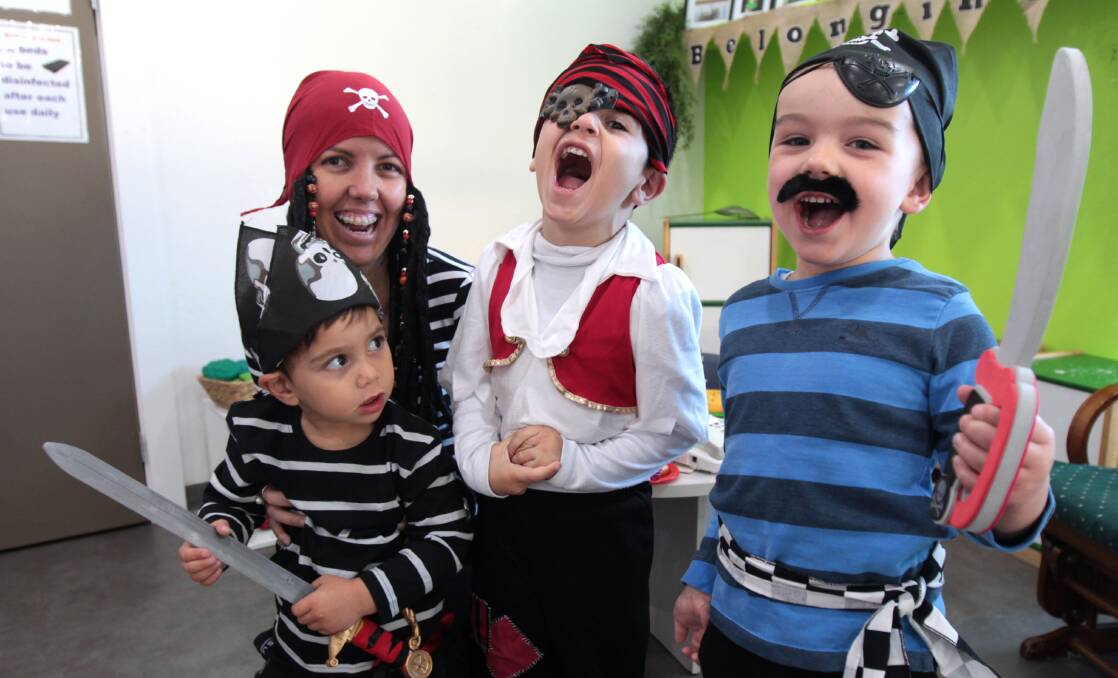 PIRATES: Ethan (3), Montessori staff member Linda Forbes, Karim (4), and Bear (4) on National Pirate Day. Picture: Simon Bennett