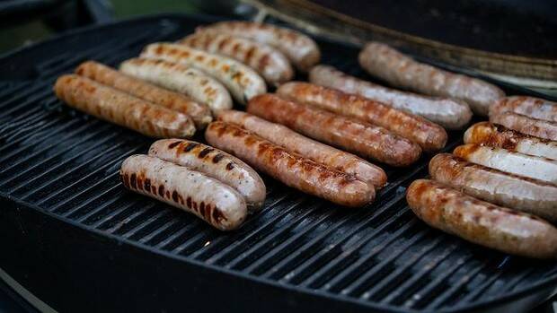 The top 10 sausages were also cooked on a Weber barbecue. Picture: Tim Grey 