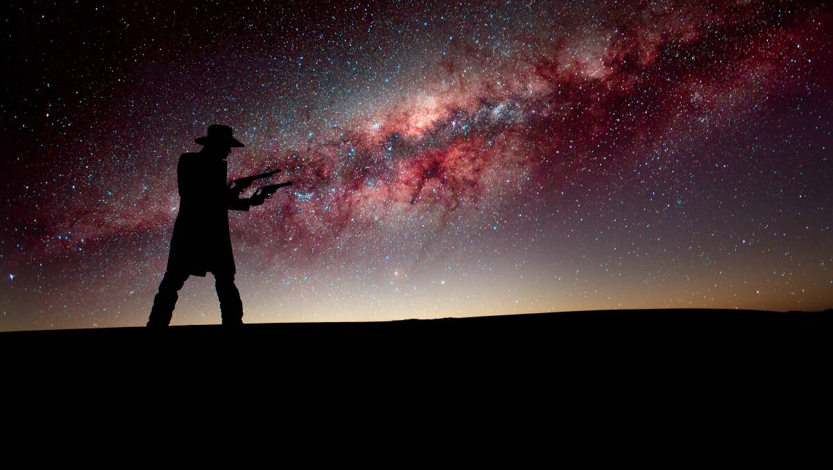 EXPLOSION: A mixture of long exposure and silhouette helped Newcastle Herald photographer Jonathan Carroll capture the Space Cowboy in his natural element.
