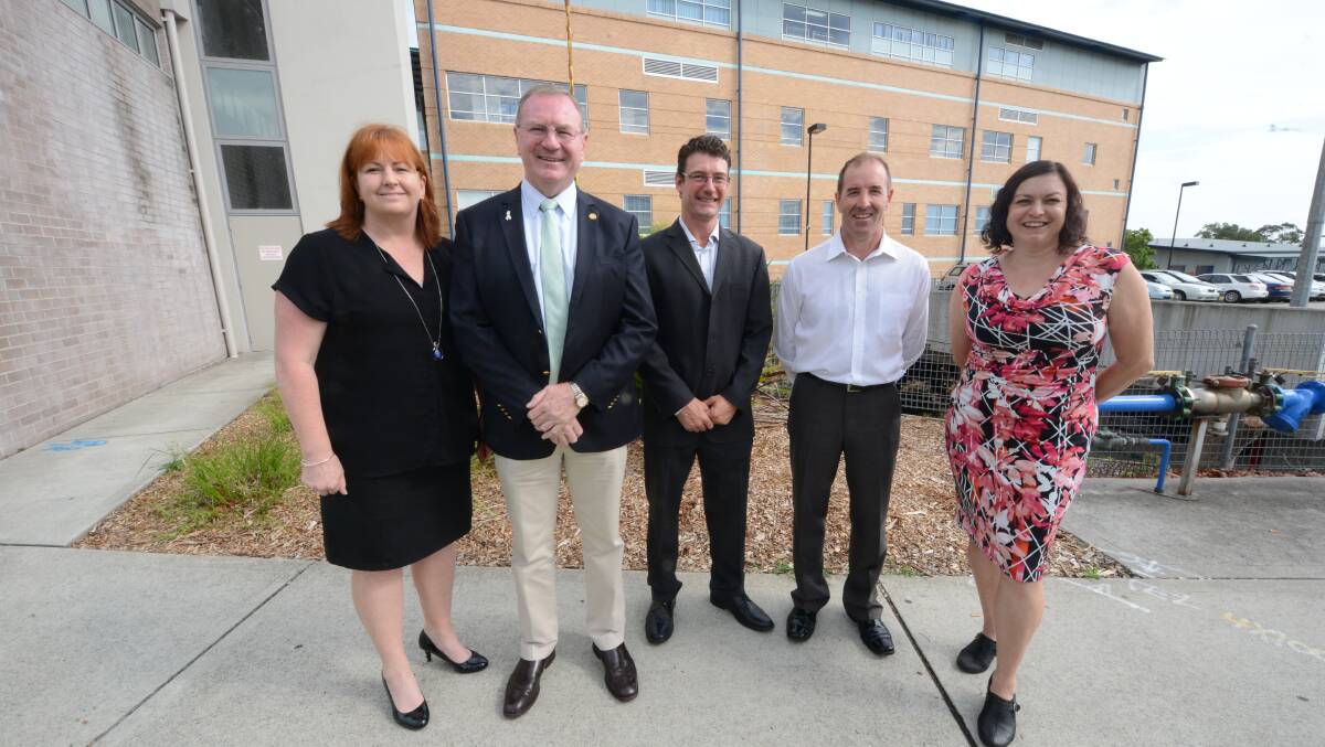 Lower Mid North Coast Sector Manager Jodi Nieass, MP Stephen Bromhead, project manager Mark Vanduros, AW Edward's Kimbal Dunham and redevelopment change manager Deborah Bliss in front of the York Street car park - the site of the new Oncology and Renal Unit at Manning Hospital. 