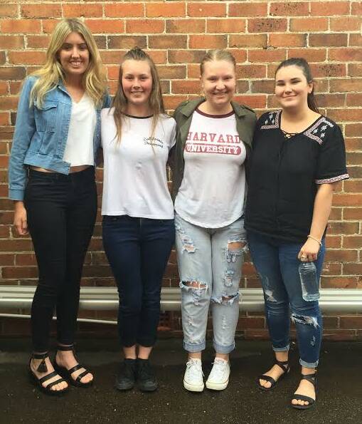 One down: Olivia Nelson, Melanie Walker, Chloe Berg and Ali Cleaver after sitting English paper one for the HSC at Taree High School. 