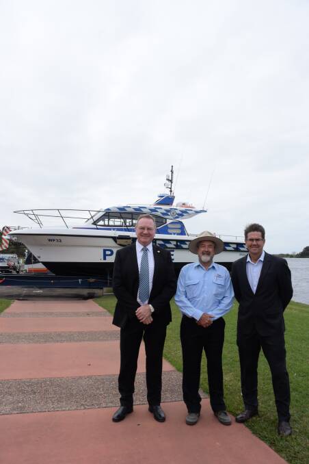 Member for Myall Lakes Stephen Bromhead, Steber International general manager Alan Steber and regional roads, maritime and transport parliamentary secretary Kevin Anderson at the launch of the new NSW Water Police vessel. 