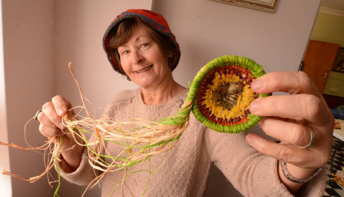 Weaving art: Jennifer Dayment, one half of art duo Sweetpea and Mumma, holds a basket she weaved in Alice Springs. “By being in their presence of Aboriginal women and listening to their stories I learnt so much," she said. 