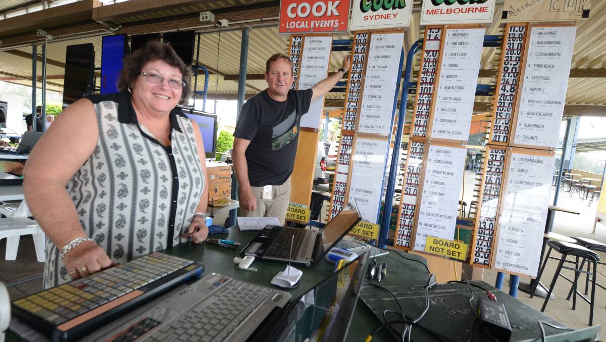 Bookmakers' clerks Leslee Bond and Mark Arndell 