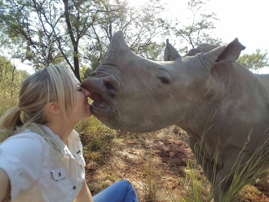 Affectionate: Laura Ellison and Grace at The Rhino Orphange in South Africa. “I just have this real desperation to help them,” Laura said.  