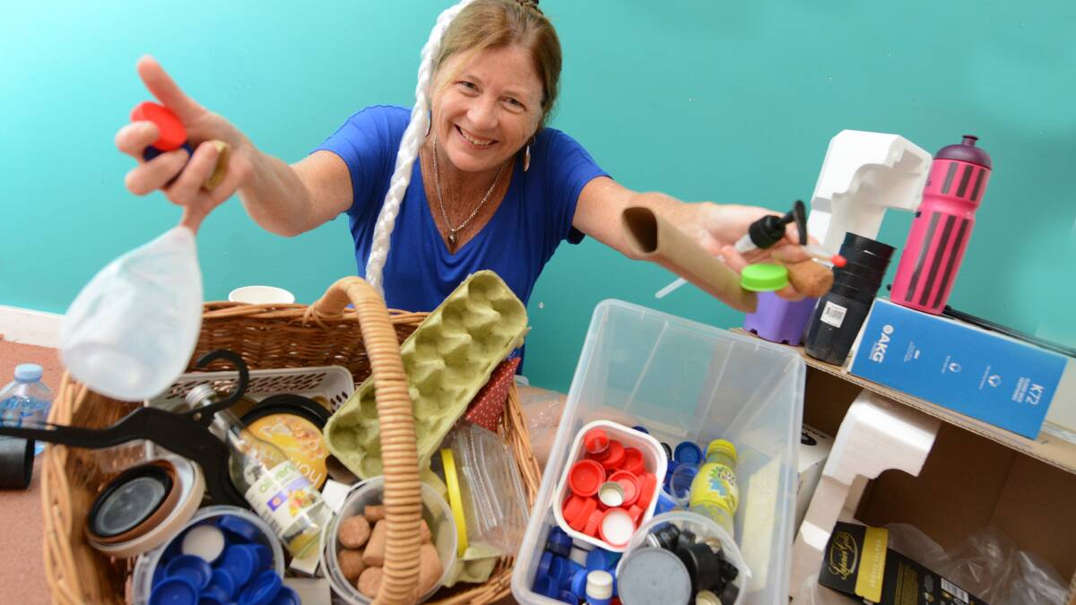 Make old new again: Jo Wallace is surrounded by recycled materials that can be used to create a panel for Taree's first recycled maze for this year's Envirofair. Jo has returned to co-ordinating Envirofair after more than a decade. 