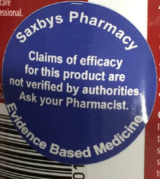 The sticker inside Saxby's Pharmacy. 