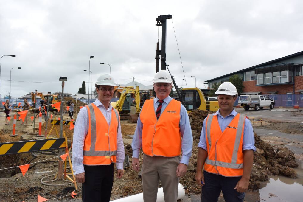 Coffey project manager Mark Vandoros, member for Myall Lakes Stephem Bromhead and AW Edwards Construction site manager Paul Stubbs at the Pulteney Street car park site at Manning Hospital. 