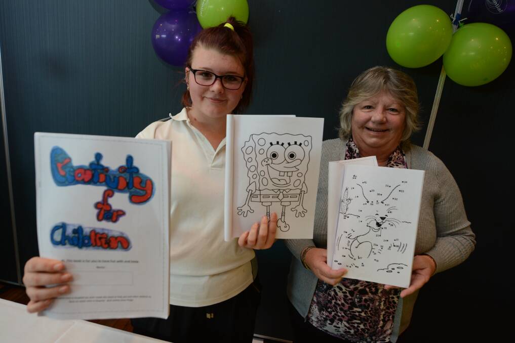 Chatham High School student Paige Harris, with support from mentor Rhonda Keegan, made a colouring in and activities book for children in hospital. 