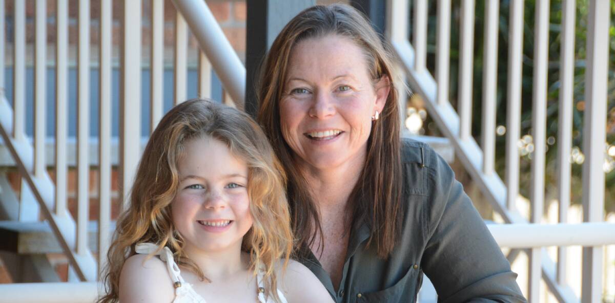 No problem too big: Rebecca Cross with her daughter Amaya. Rebecca is Australia's Backyard Legend for the help she gives to others. 