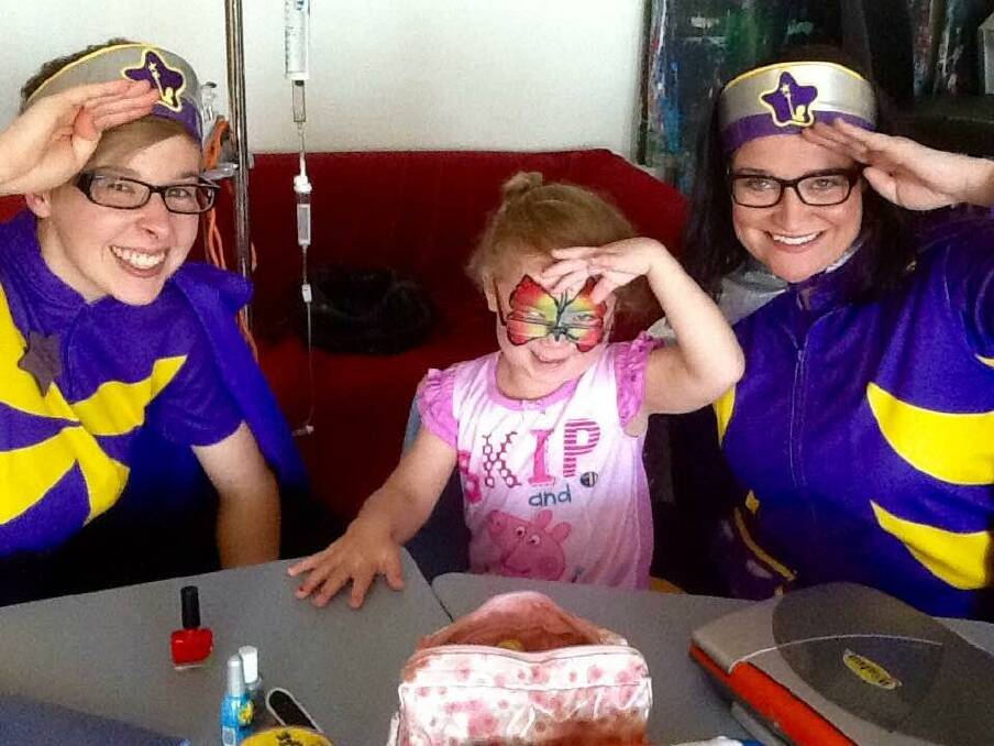 Captains Starlight with patient Forster Marli Smith at Manning Hospital. Marli had her nails painted beautifully. 