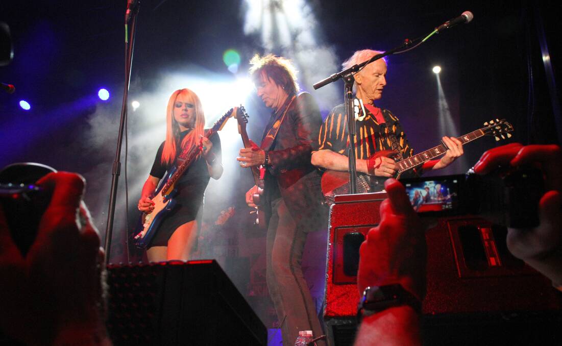 LOVE THAT ROCKS: Guitar super couple Orianthi and Richie Sambora performing at a charity show alongside The Doors' Robby Krieger. 