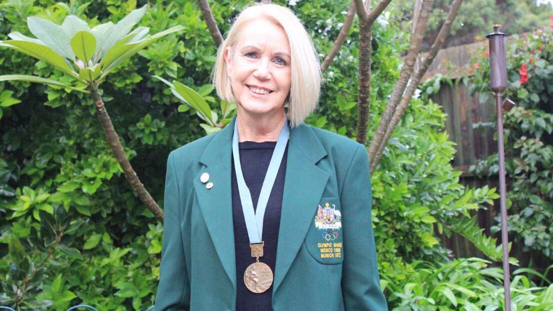 Karen Stephenson says she can still fit into her Olympic blazer, thanks to her exercise regime. Picture: Andrew McMurtry