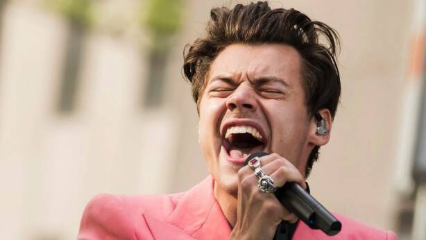 Harry Styles, who will tour Australia next year, channels Harry Nilsson in his new track Sign of the Times. Photo: Charles Sykes

