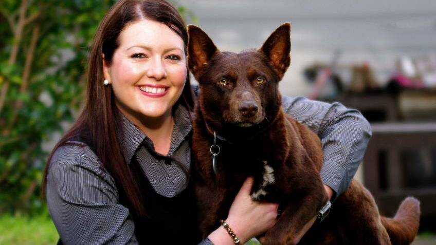 Jaimie Abbott, pictured with a rescue kelpie, has spoken out against the NSW government's backflip on greyhound racing.