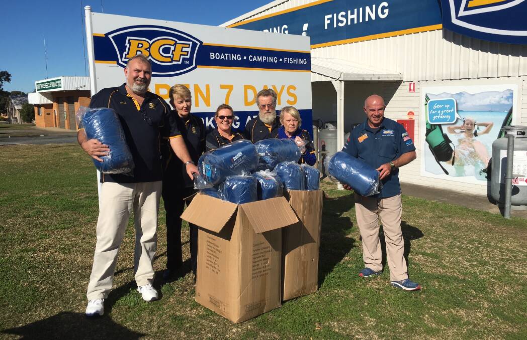Making winter easier for the needy: Michael Byrne (club president), Jan Swift, Janet Byrne, Ian Cahill, Catherine Sheehy and Chris Martin (manager of BCF Taree).