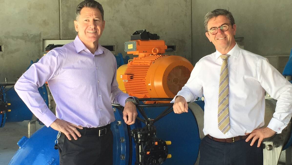 New development: Dr David Gillespie and MidCoast Water’s general manager Ken Gouldthorp inspect the Darawank pump station.