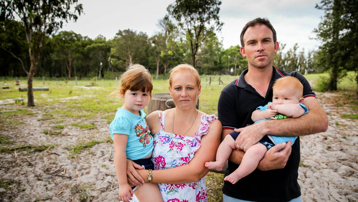 Disappointed: Williamtown residents Cain and Rhianna Gorfine with their children Bronte and Ryan. Picture: Ryan Osland