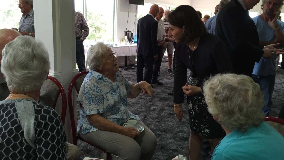 Premier Berejiklian speaking with Noreida Fotheringham during the meet and greet at Wingham Golf Club.