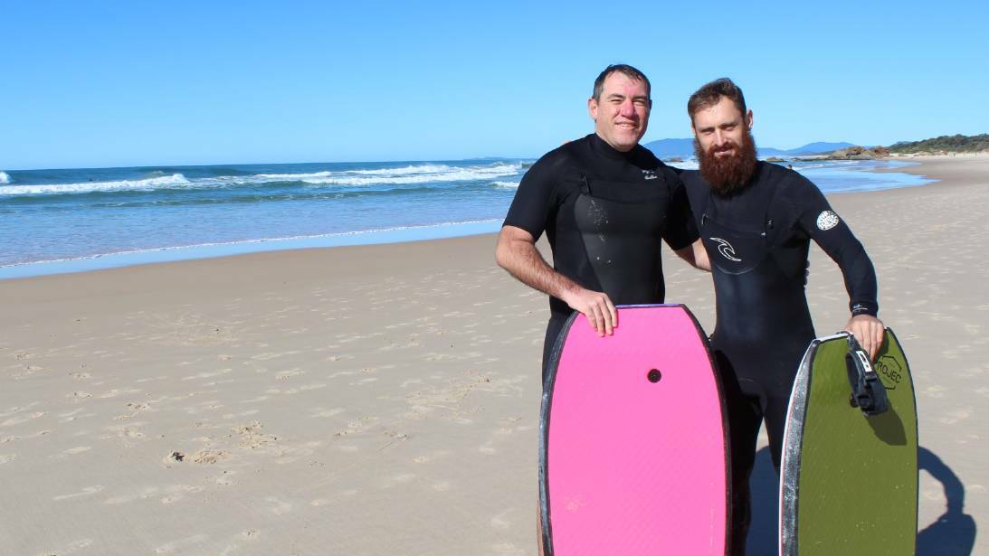 Shark attack survivor Dale Carr and his mate Shane Roche who rescued him from the water at Lighthouse Beach. Shane has been nominated for a Pride of Australia Award. Photo: TRACEY FAIRHURST