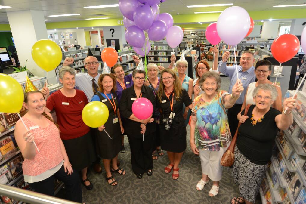 Celebrating: MidCoast Council staff and volunteers are proud of the services and space offered to the community at Taree Library. (Back row from left) Jess Hadwell, Fiona Worth, manager libraries Chris Jones, Cheryl Pickard, volunteer Nancye Swan, Anne Jones, Danielle Donnelly, director of community spaces and services Paul de Szell and Tanya McLean. (Front row from left) Christine Arens, Lisa Greenwood, Kellie-Kingsley-Wilson and volunteers Lyn McMartin and Gloria Toohey.