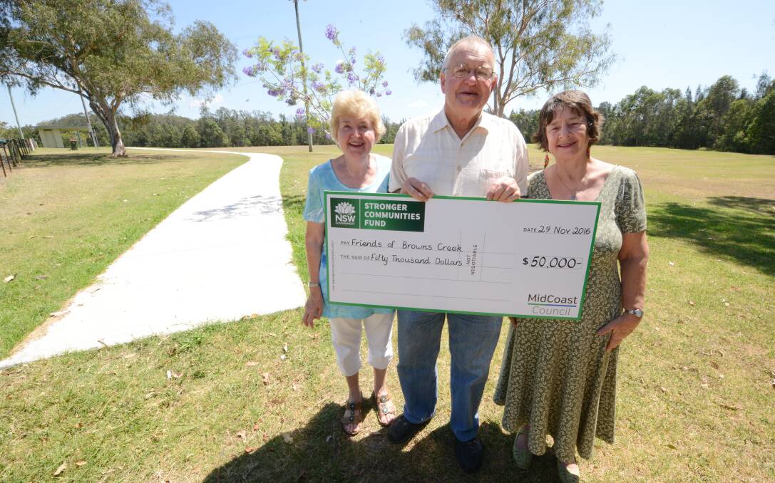 The Friends of Browns Creek walkway will be extended with $50,000 and volunteers Jenny and John Elcoate and Helen Hannah are delighted!