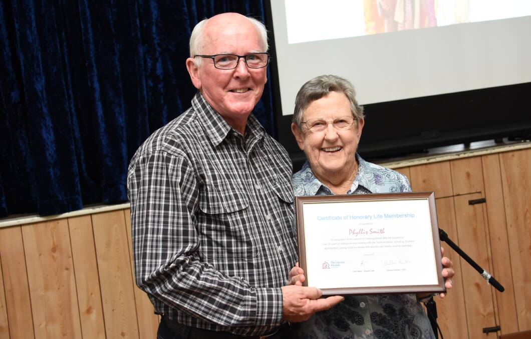 National Board Chairman of The Leprosy Mission Australia Dr Colin Martin presents the Life Membership Award to Taree Leprosy Mission Auxiliary president, Phyll Smith.