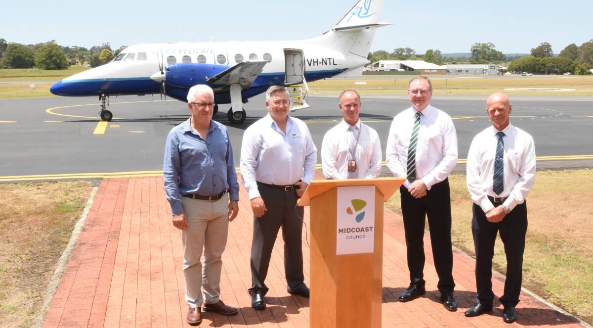 British Aerospace Jetstream aircraft will service direct flights from Taree to Sydney. Pictured at the announcement is (from left) MidCoast Council's general manager Glenn Handford, council's director, community spaces and services, Paul De Szell, FlyPelican CEO Paul Graham, member for Myall Lakes Stephen Bromhead and    mayor David West.