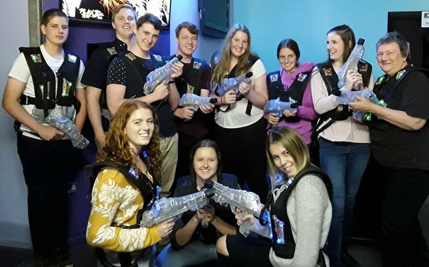 St Clare's High School year 12 business studies students and teacher, Lyn Tilbrook teamed up for a game of laser tag during a recent excursion to Port Macquarie. (Back row from left) Jacob Cribb, Timonthy Daczko, Thomas Debenham, Anthony McMullen, Abbie Towers, Jessica Cheers, Hannah Burley and teacher, Lyn Tilbrook. (Front row from left) Brooke Berg, Stephanie Poole and Lillie Oirbans.