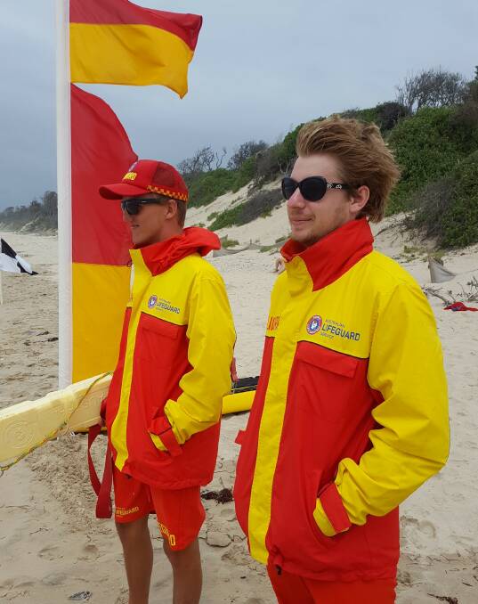 Lifeguards Brock Van Kampen and Anthony Irving on duty at Old Bar Beach, where they performed five rescues in two days last week.